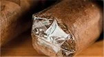 Should I remove the cellophane wrapper from a cigar?